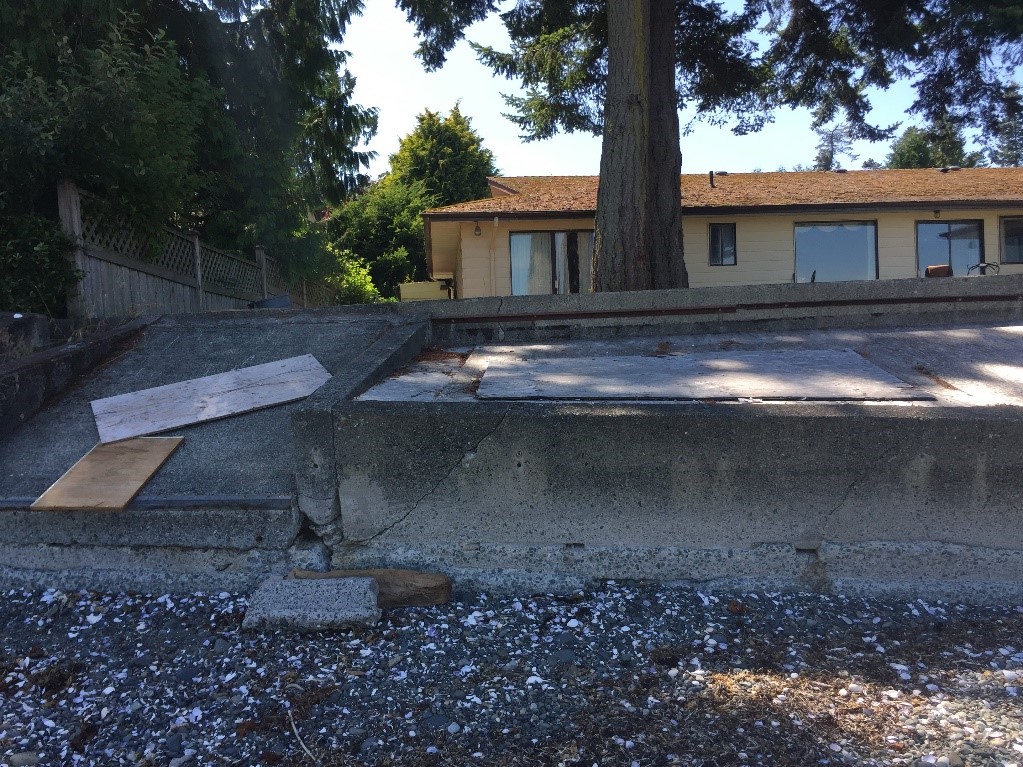 Crumbling seawall on Vancouver Island Shoreline